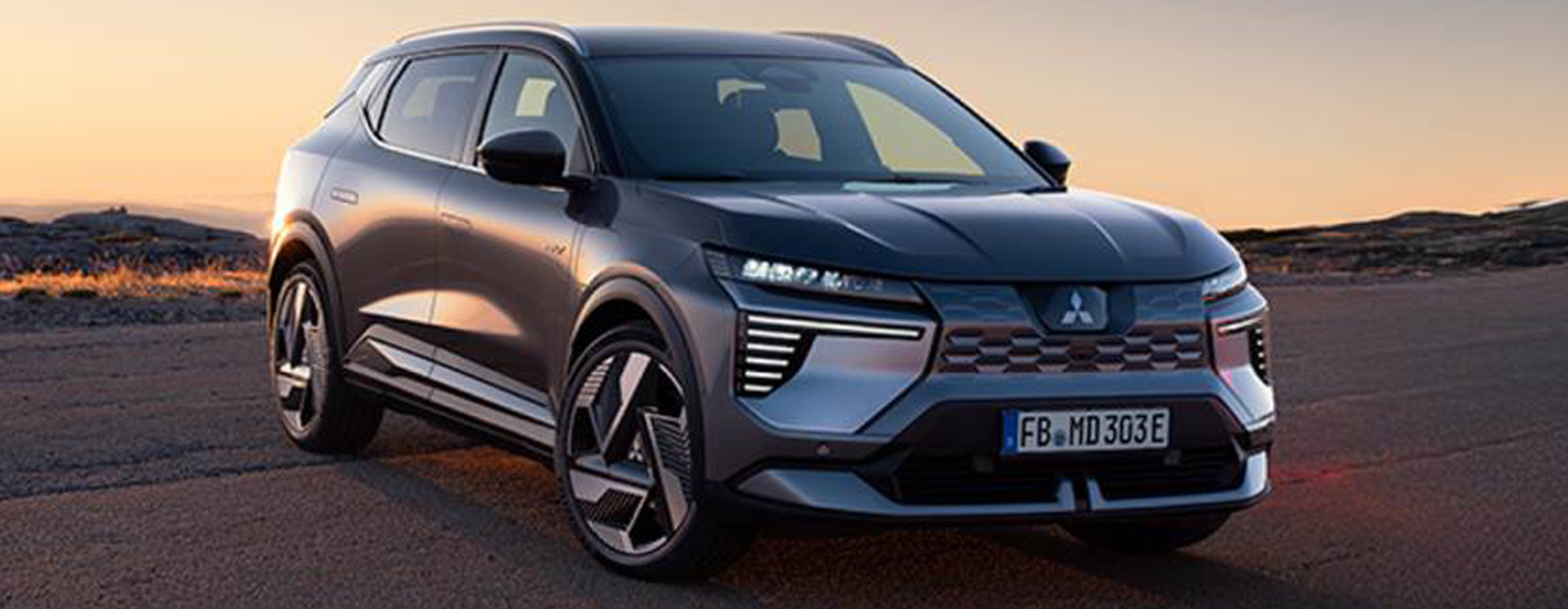 Der neue Mitsubishi Eclipse vor Sonnenuntergang Stimmung als Hintergrund